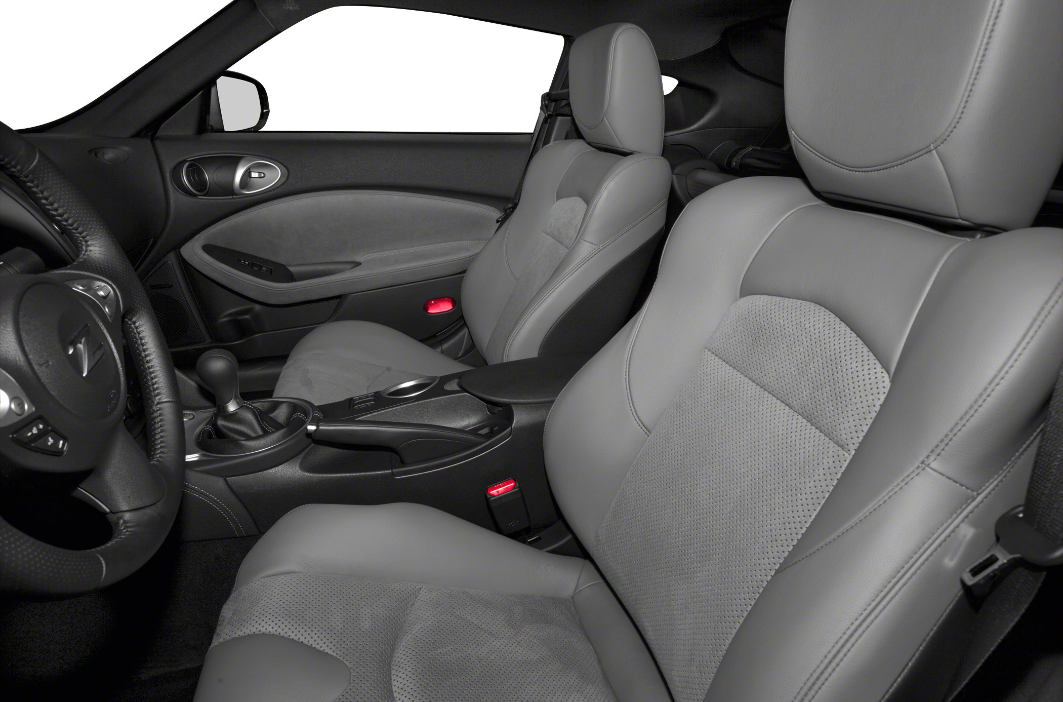 Front leather seats with manual gearshift in sports coupe interior