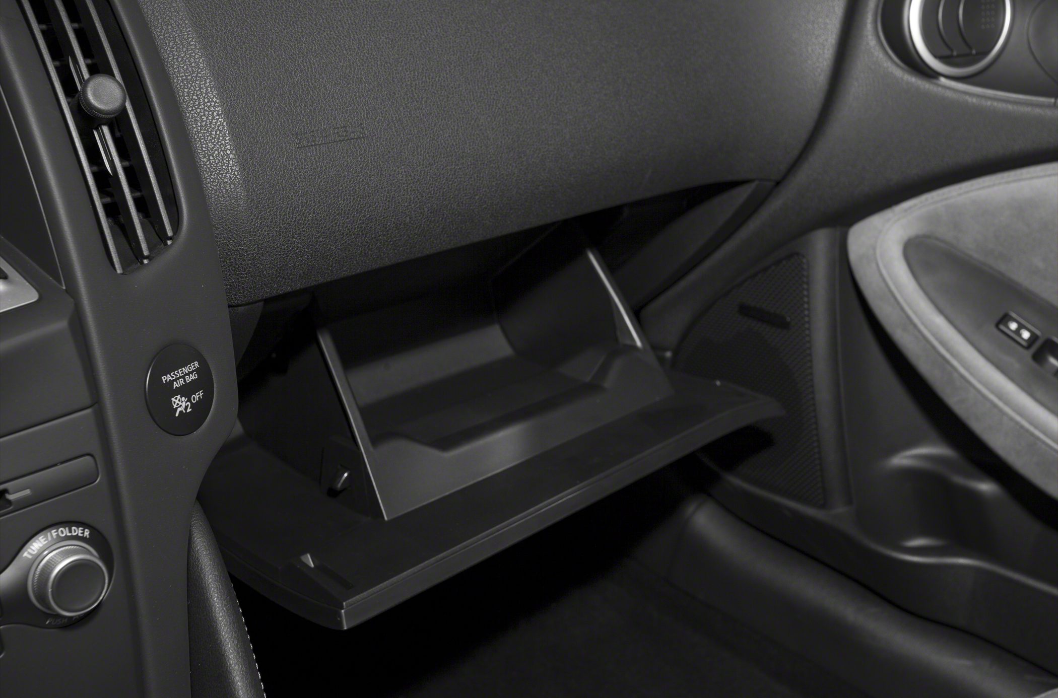 Open glovebox with dashboard and airbag switch