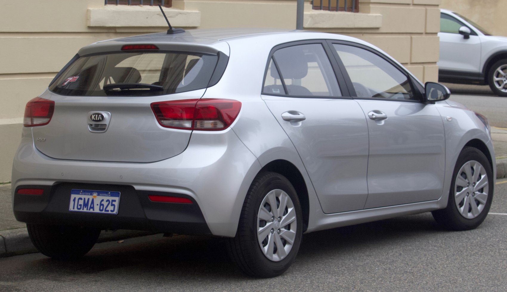 Silver hatchback rear with modern tail lights and smooth body design