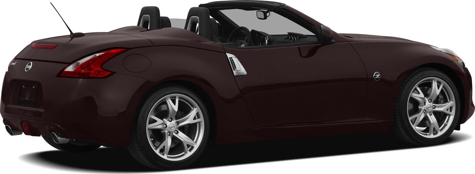 Sporty convertible with alloy wheels and distinct tail lights, open roof design.