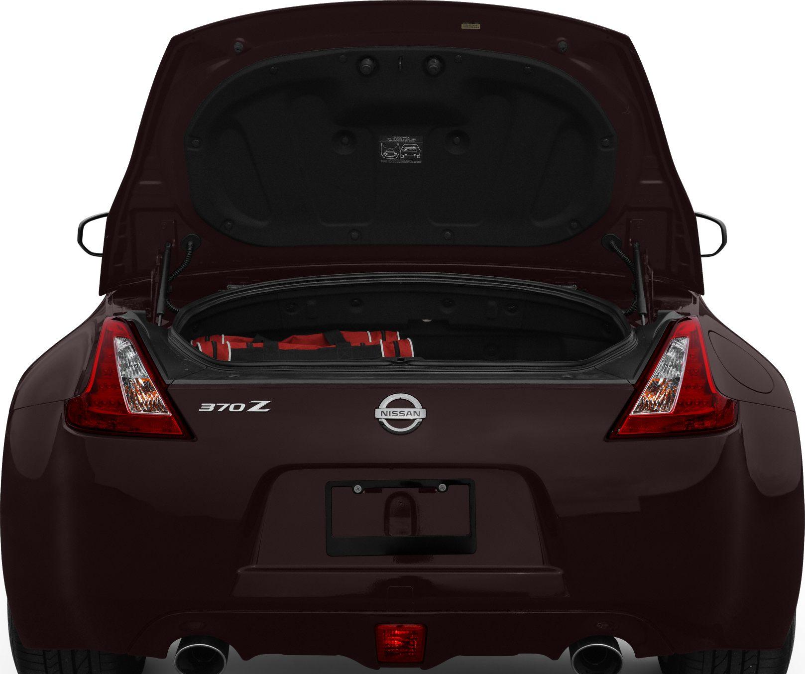 Open trunk and rear taillights view with visible logo and badge