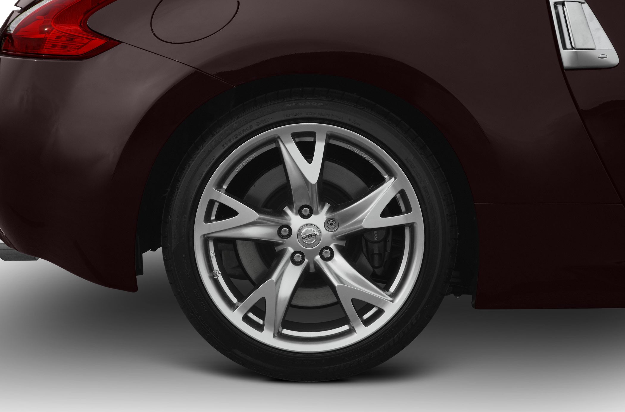 Close-up of alloy wheel and tire with brake caliper on a sporty vehicle