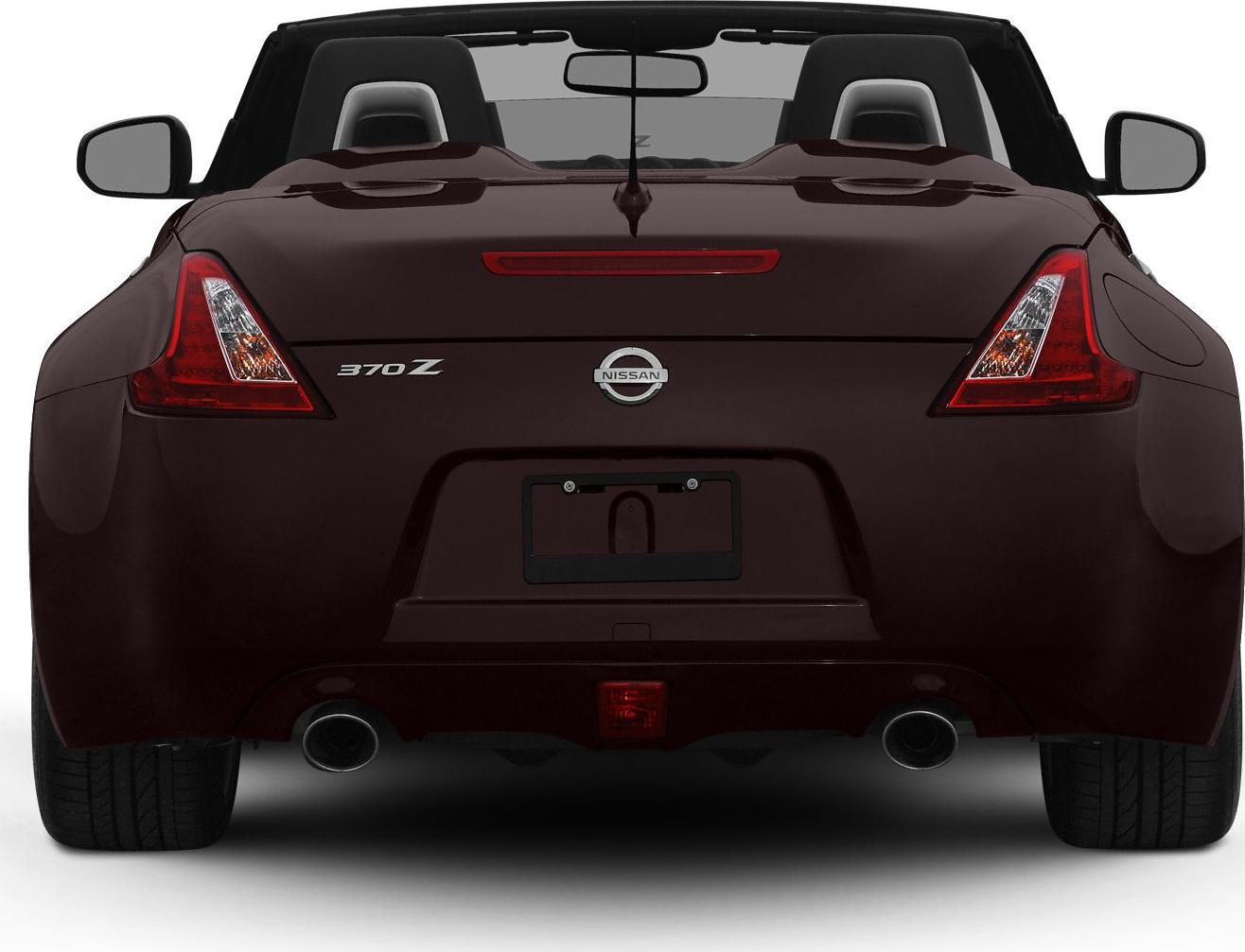 Dual exhaust pipes, sleek taillights, convertible rear view