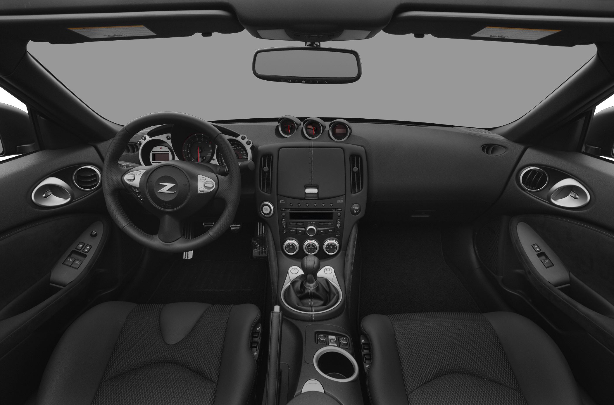 Sporty dashboard, instrument cluster, manual gear shift, ergonomic steering wheel