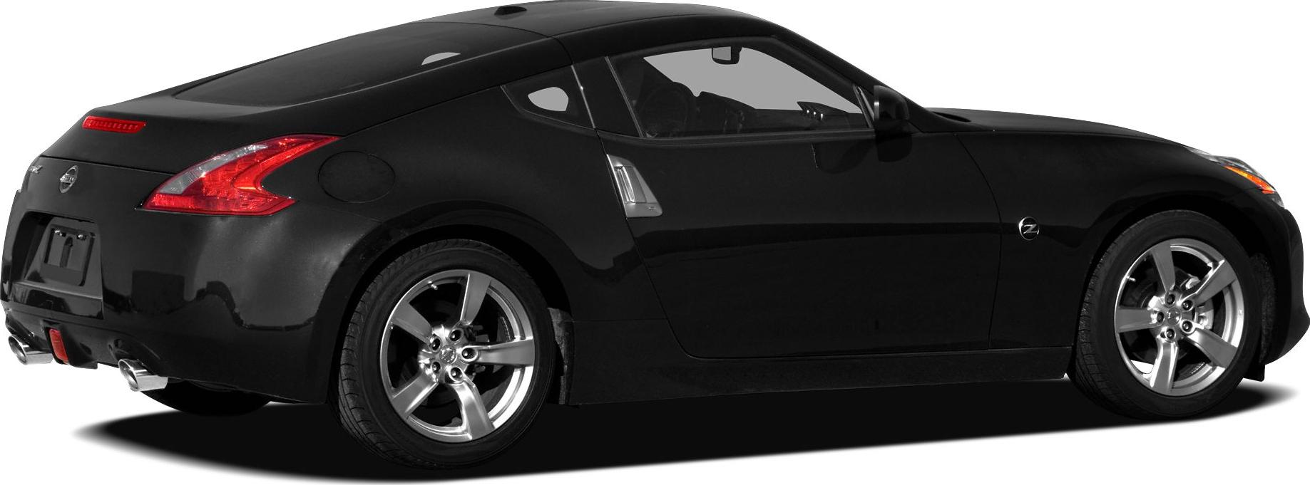Rear side profile with dual exhaust and alloy wheels