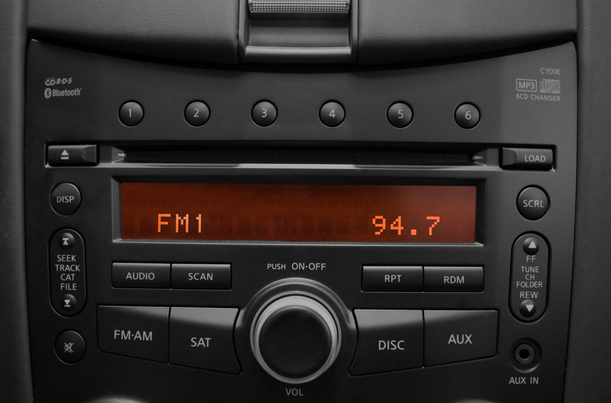 Close-up of a car stereo system with Bluetooth and 6CD changer