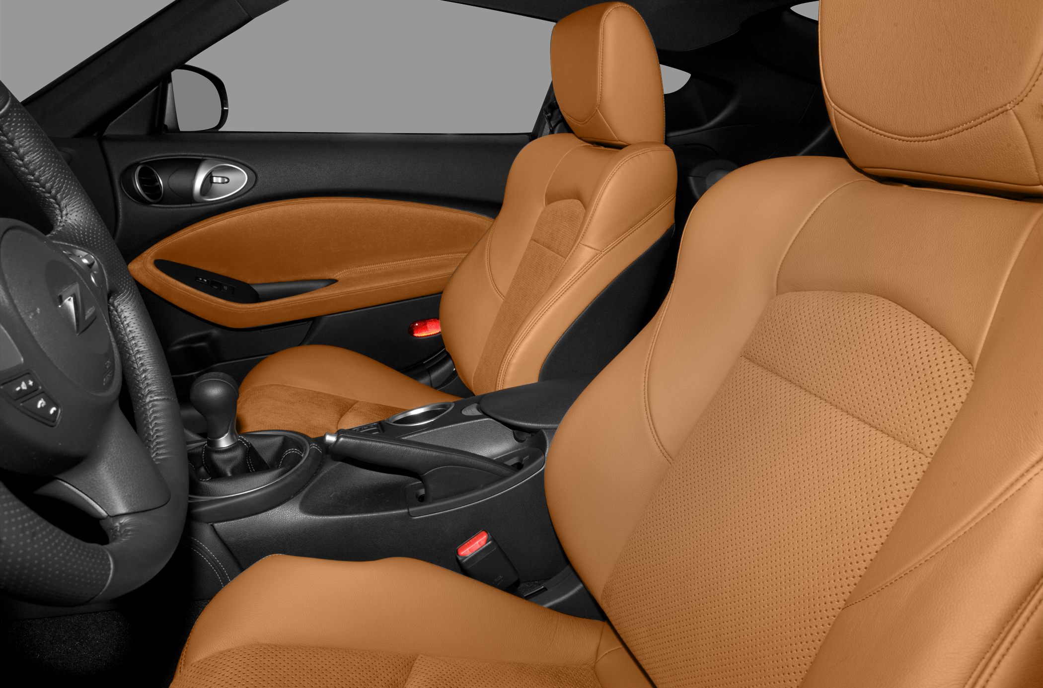 Tan leather sport seats and manual transmission interior