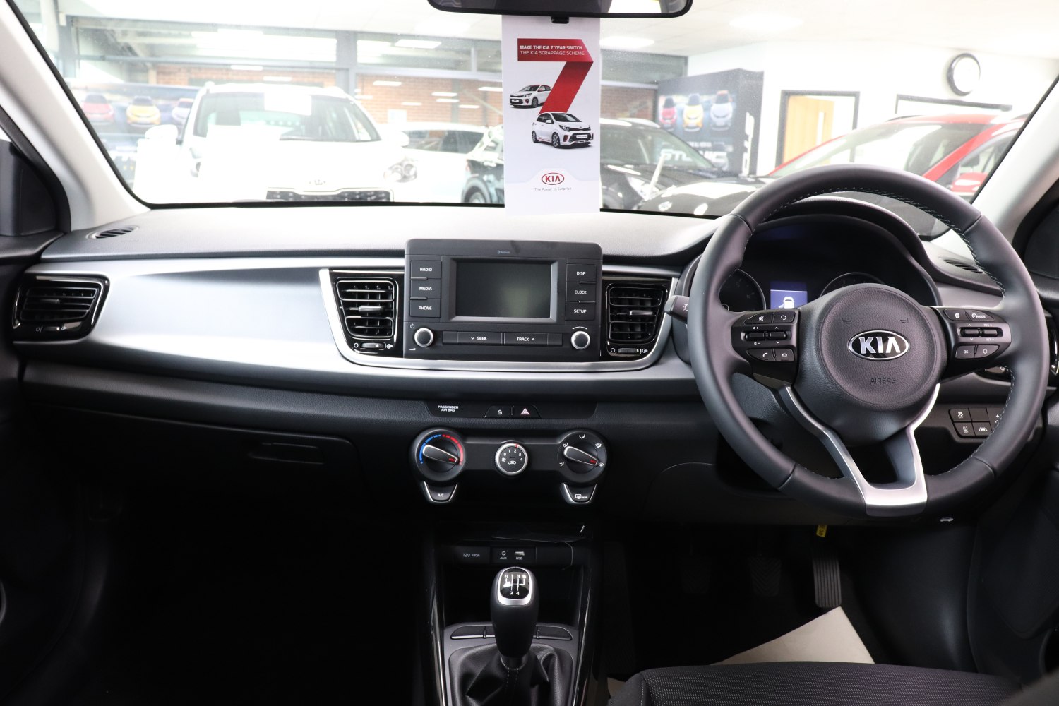 Interior dashboard and steering wheel with manual gear shift