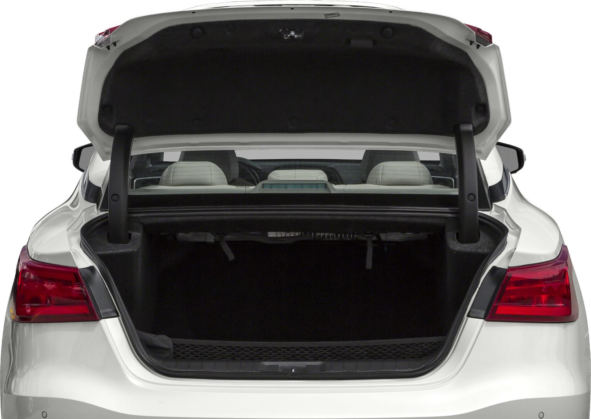 Open trunk with spacious cargo area in rear sedan.