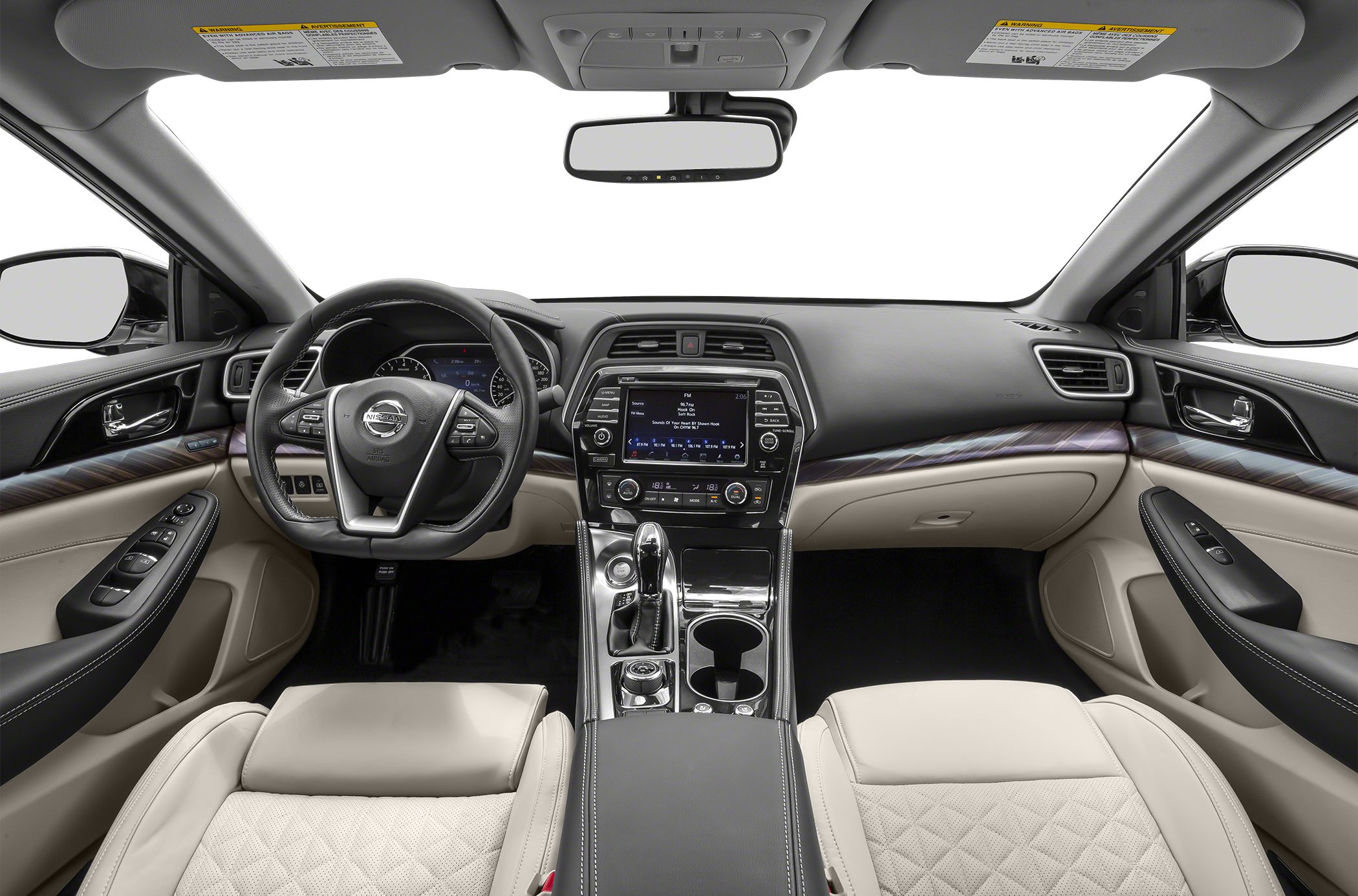 Dashboard, steering wheel, and center console with beige leather seats