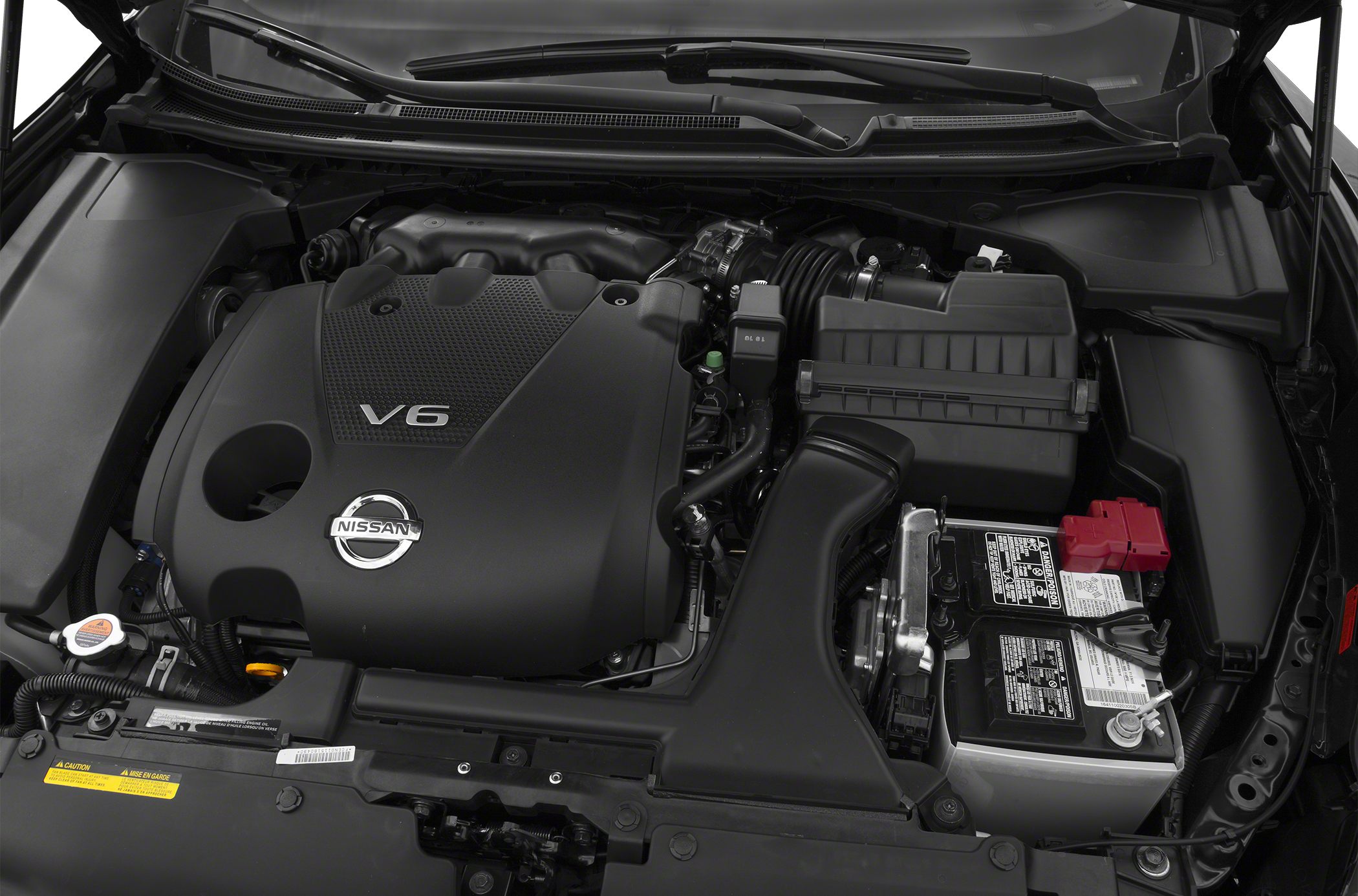 Close-up of V6 engine bay with battery and air intake components