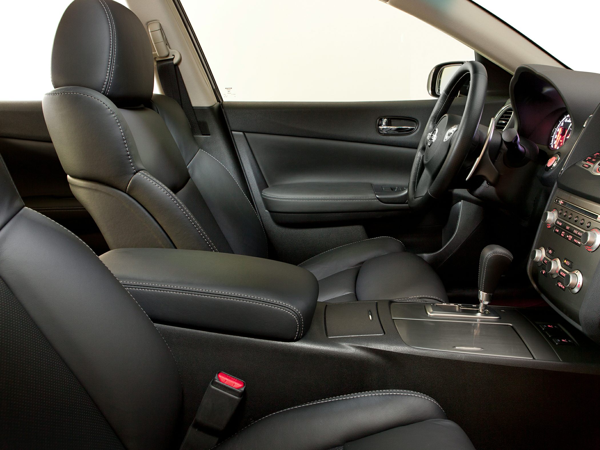 Black leather seats and modern dashboard with automatic gear shift