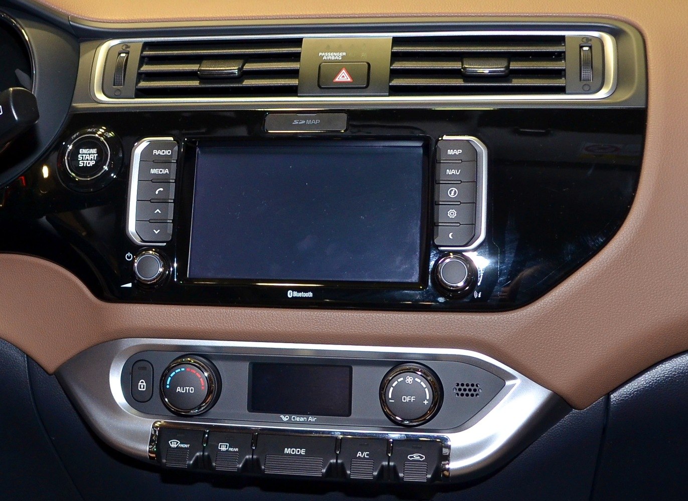 Infotainment screen, climate controls, engine start-stop button