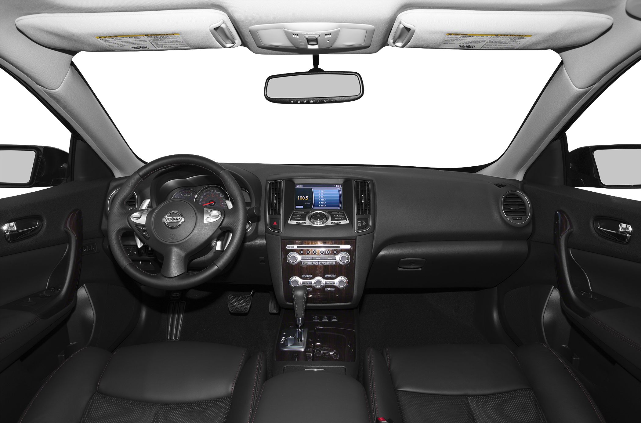 Car interior showing dashboard, steering wheel, center console