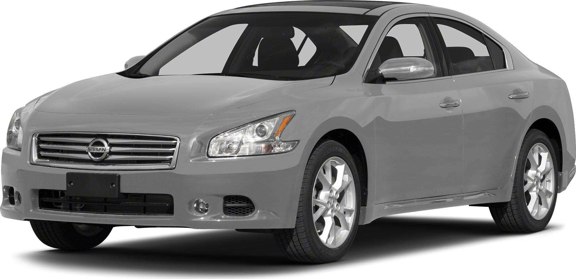 Front side view of a sedan with sleek headlights and alloy wheels