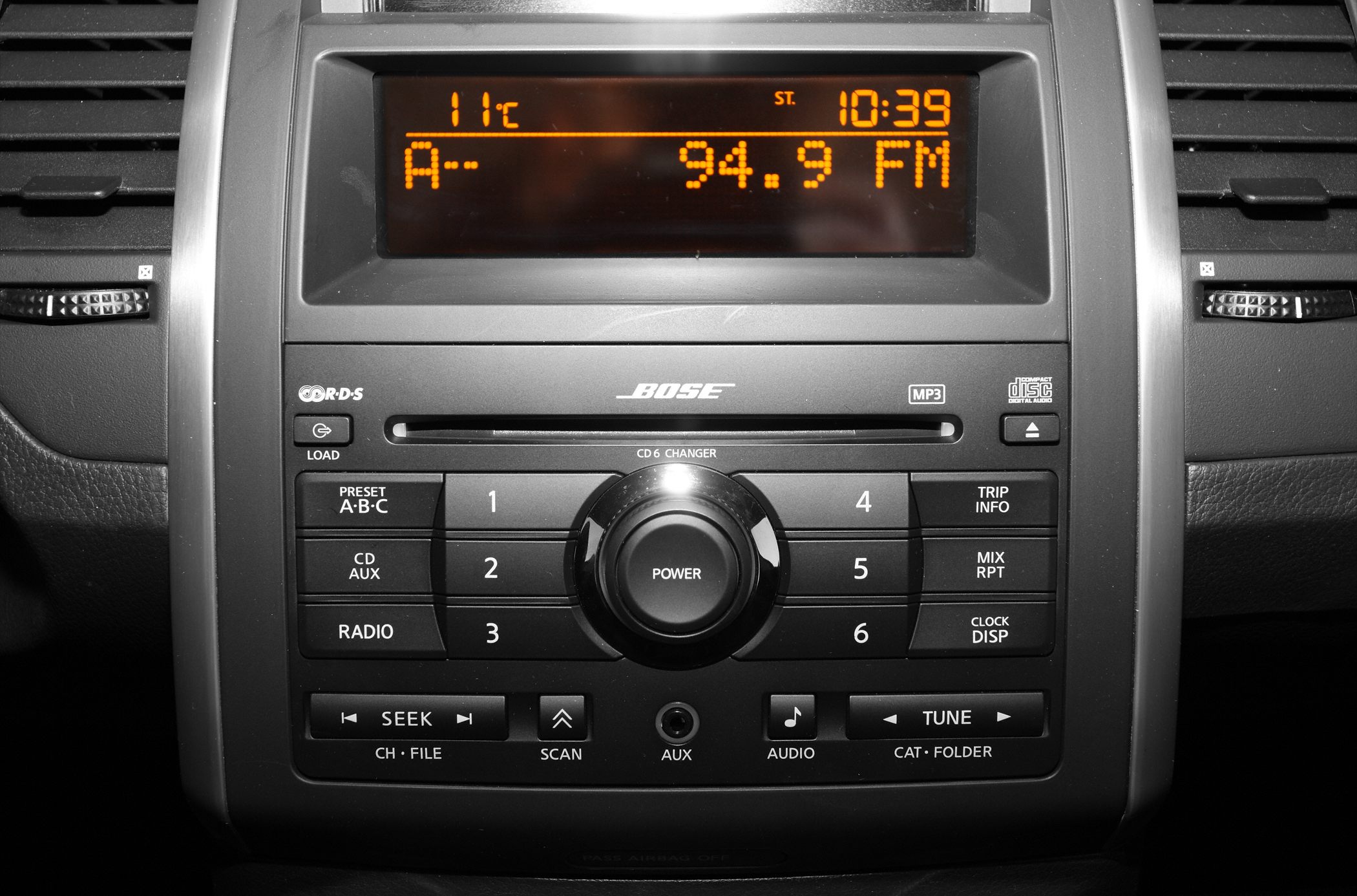 BOSE CD6 Changer audio system with digital radio display and control buttons