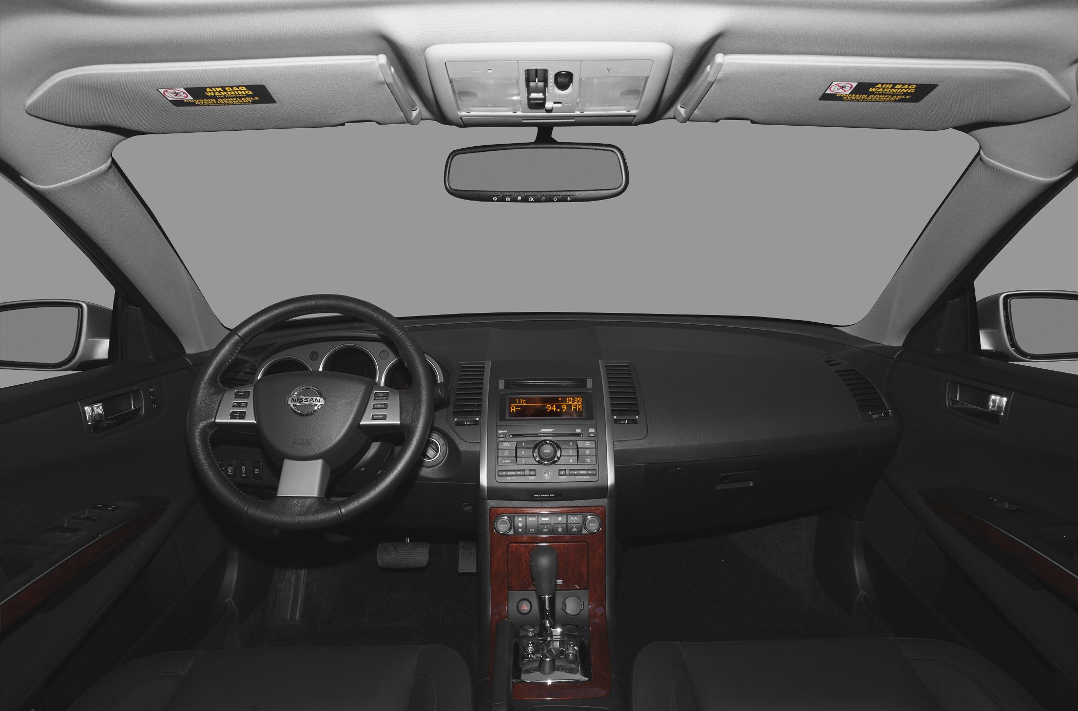 Steering wheel, dashboard, center console with wood trim
