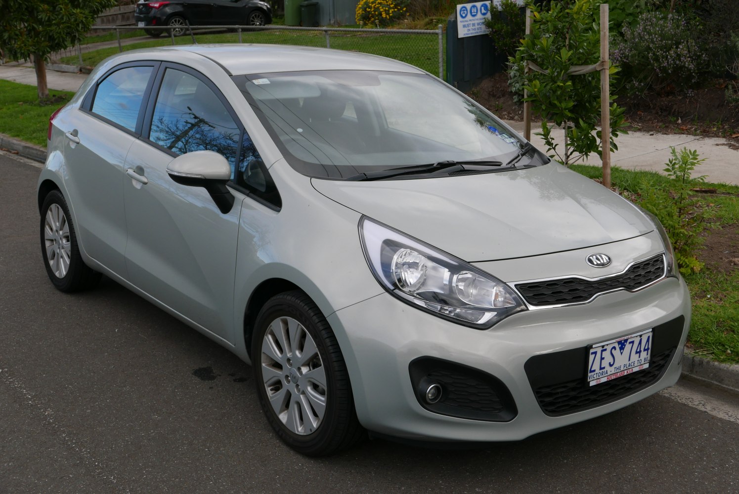Front view with sharp headlights and silver finish