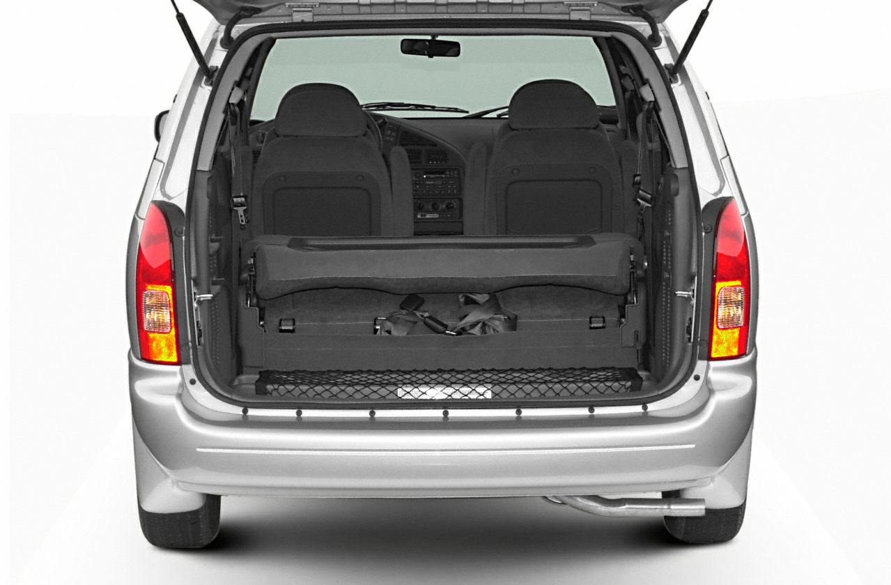 Rear hatch with folded third-row seat and visible front seats