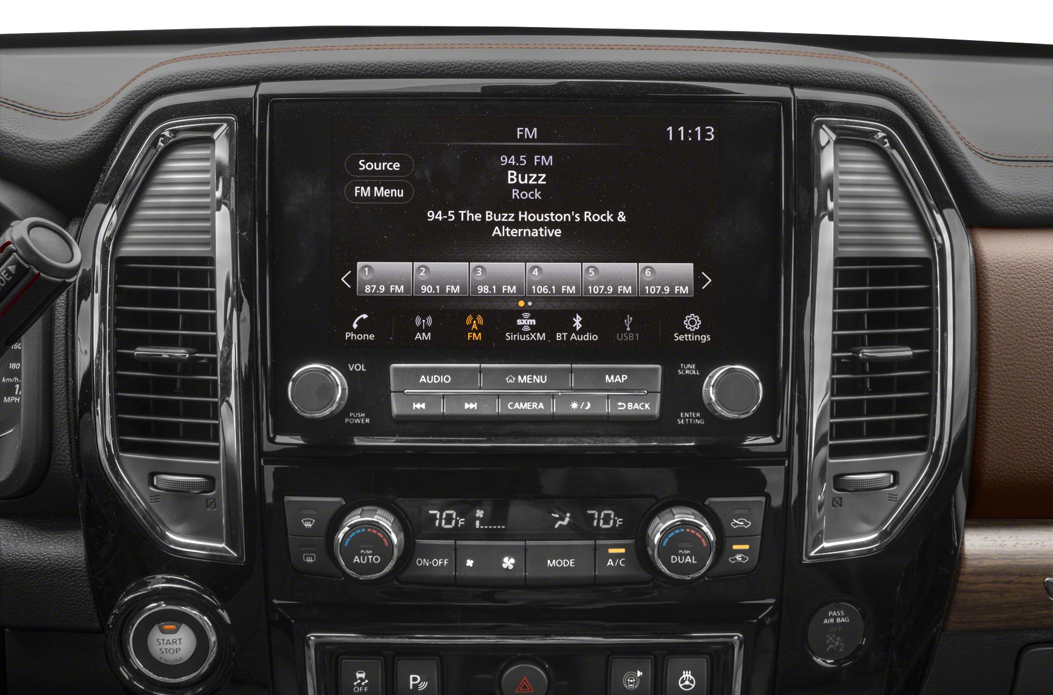 Infotainment screen and dual climate controls with vents and start stop button