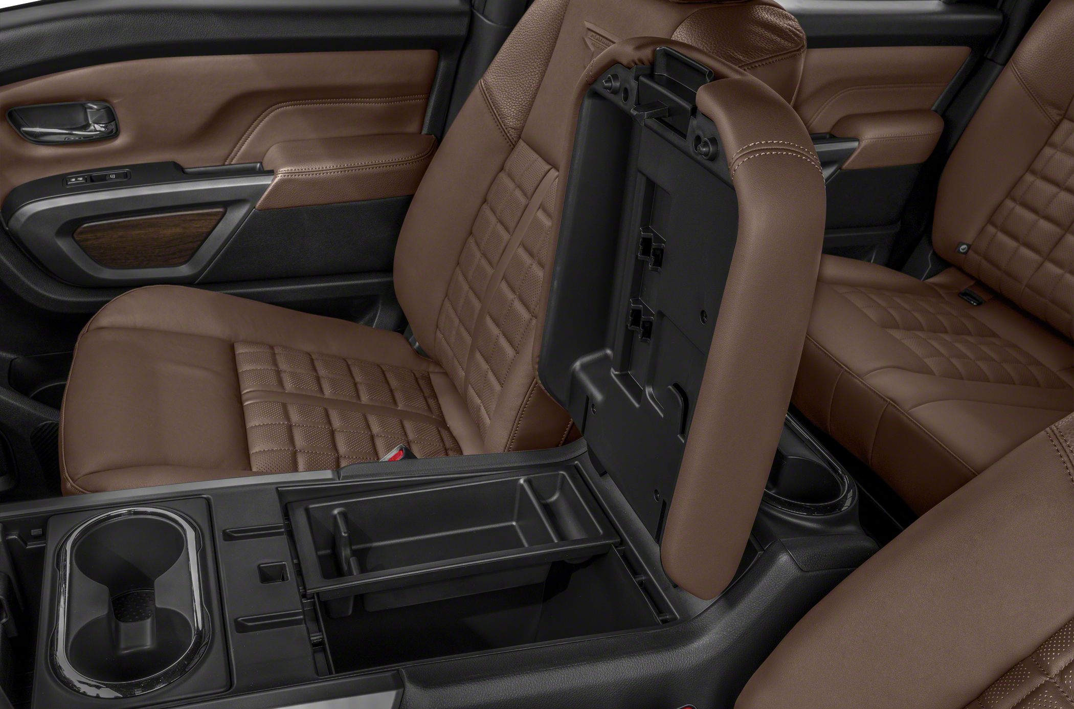 Brown quilted leather seats and open center console storage compartment
