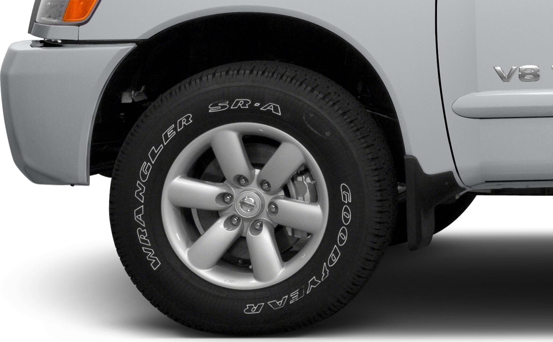 Alloy wheel with Goodyear tire and V8 badge on truck side