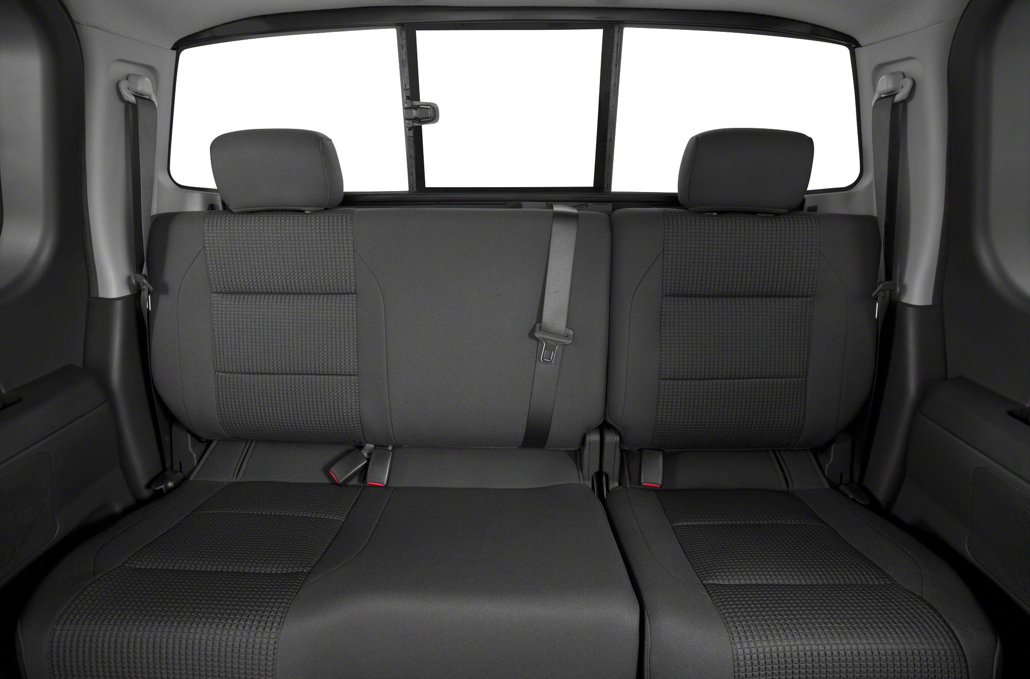 Rear seat interior with patterned upholstery and adjustable headrests