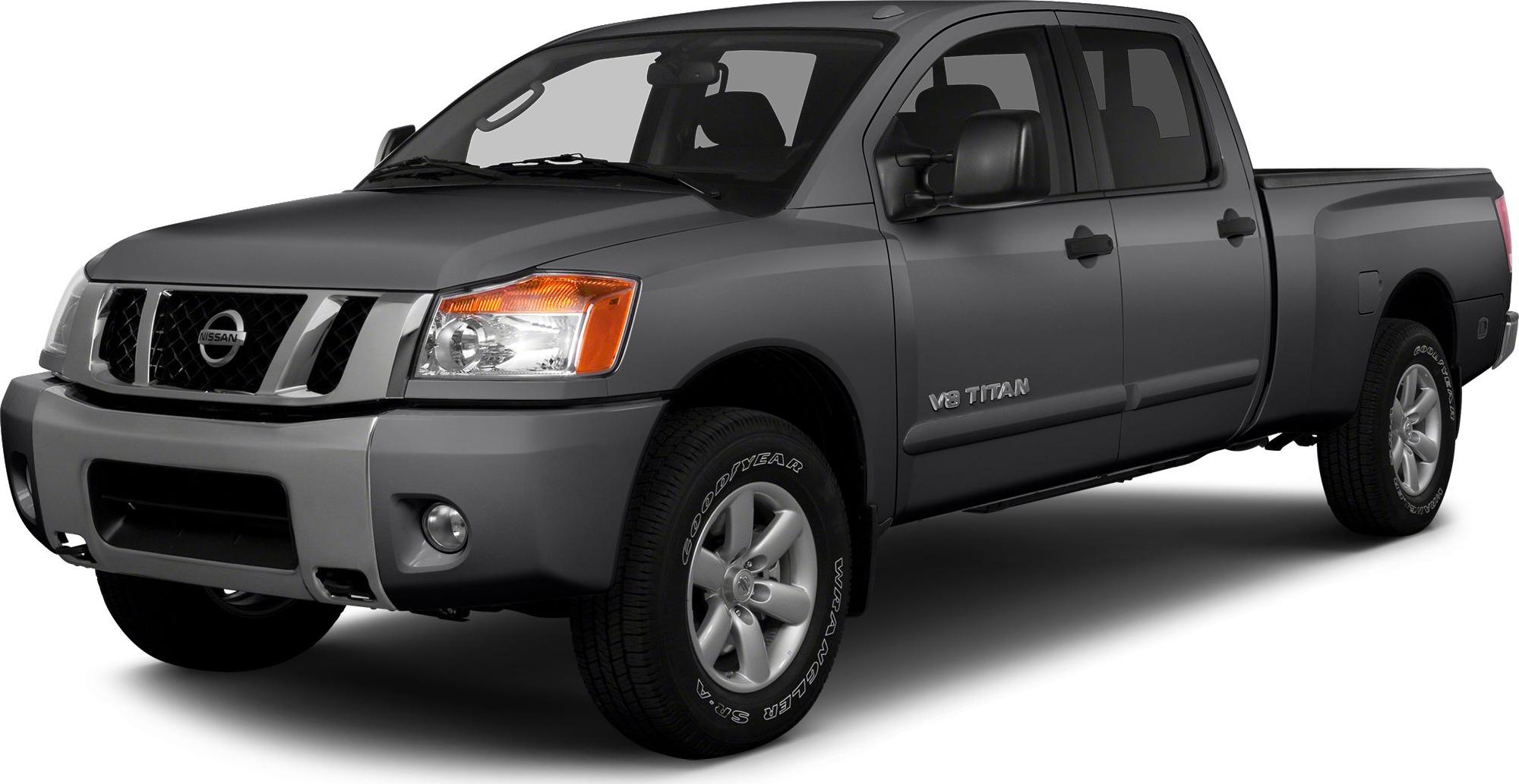 Front side view of a four-door pickup truck with V8 badge and alloy wheels.