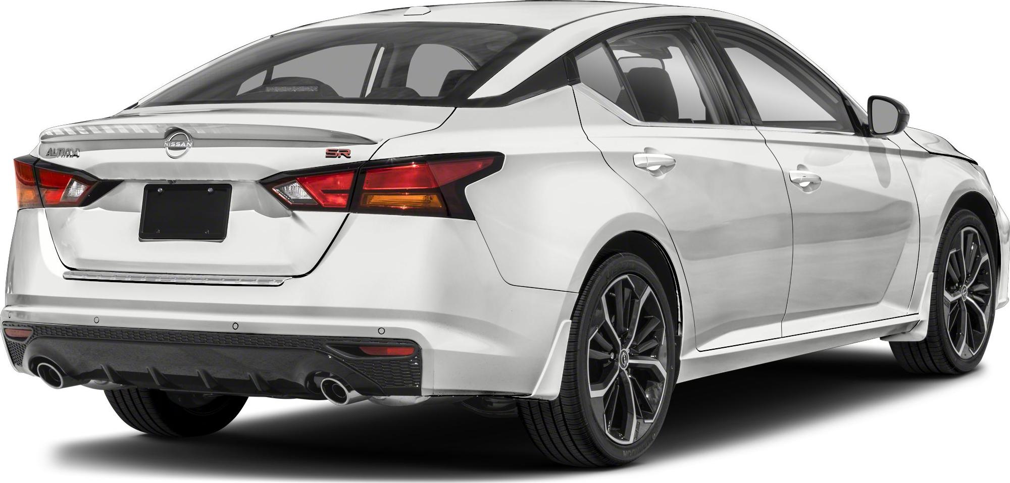 Rear view with dual exhaust and alloy wheels