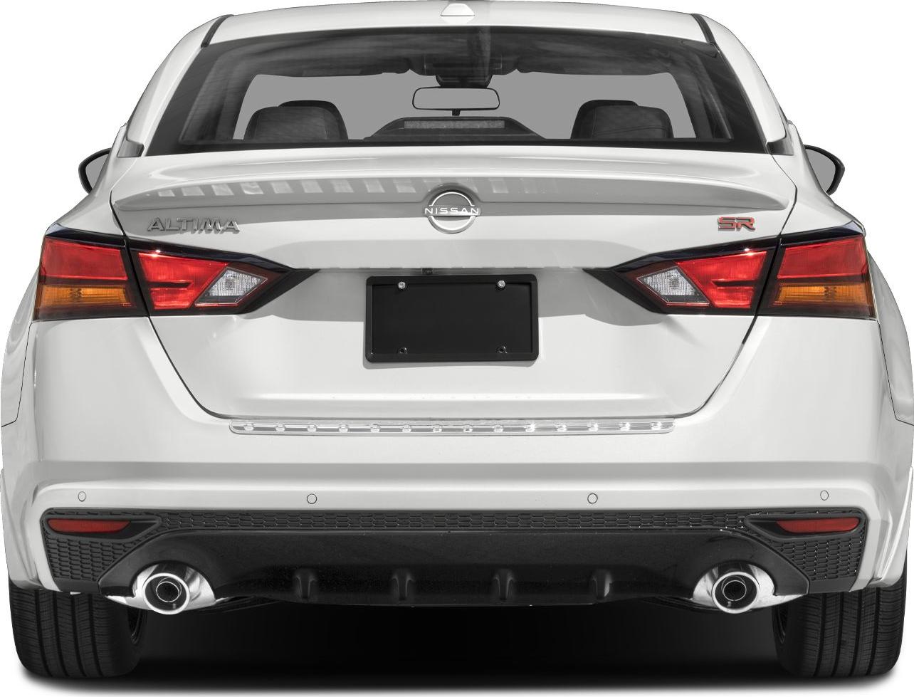 Rear view of a sedan with dual exhausts and modern taillights