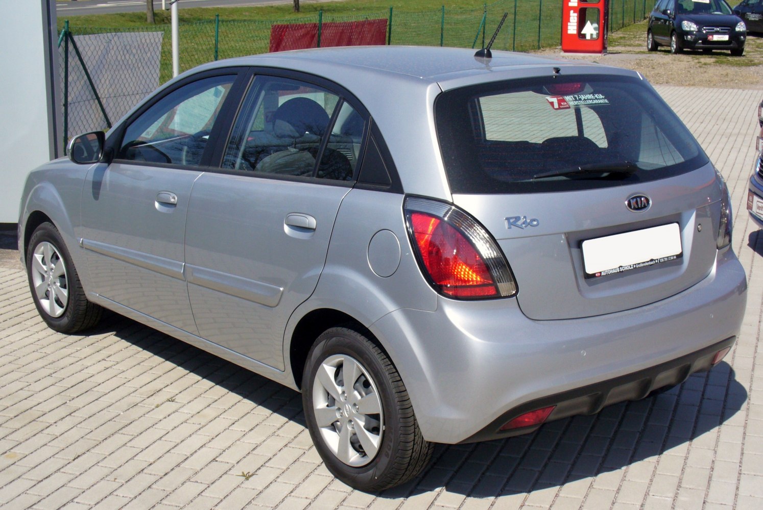 Silver five-door hatchback rear and side view with distinct taillights