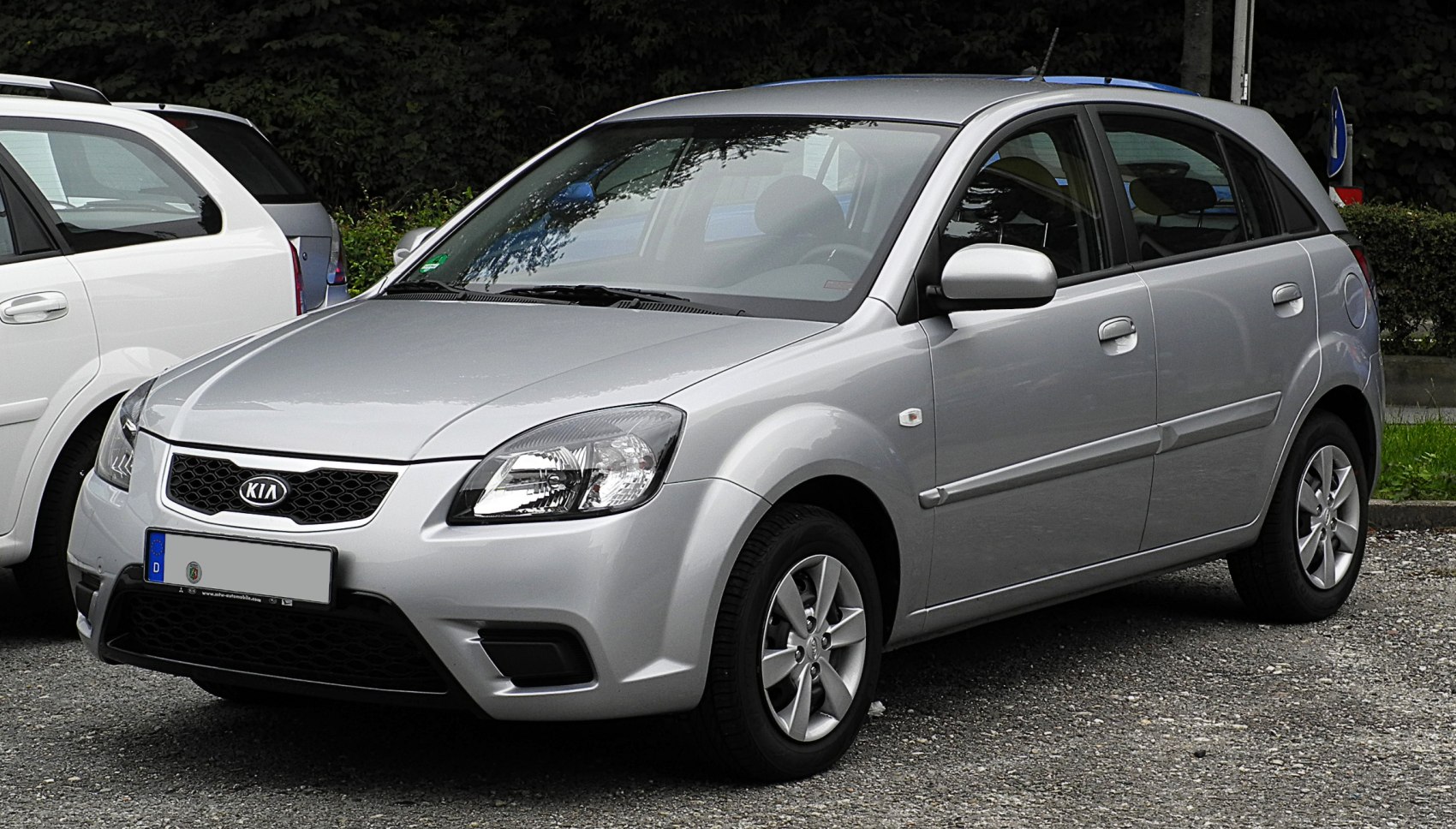 Silver 5-door hatchback with facelifted front grille and headlights