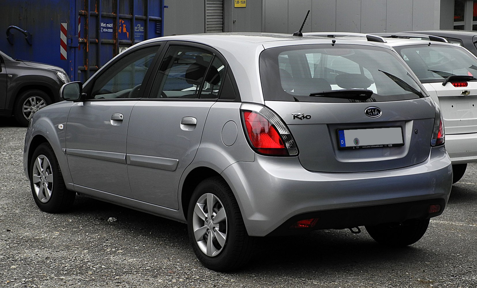 Rear and side view of silver hatchback with alloy wheels and distinct taillights