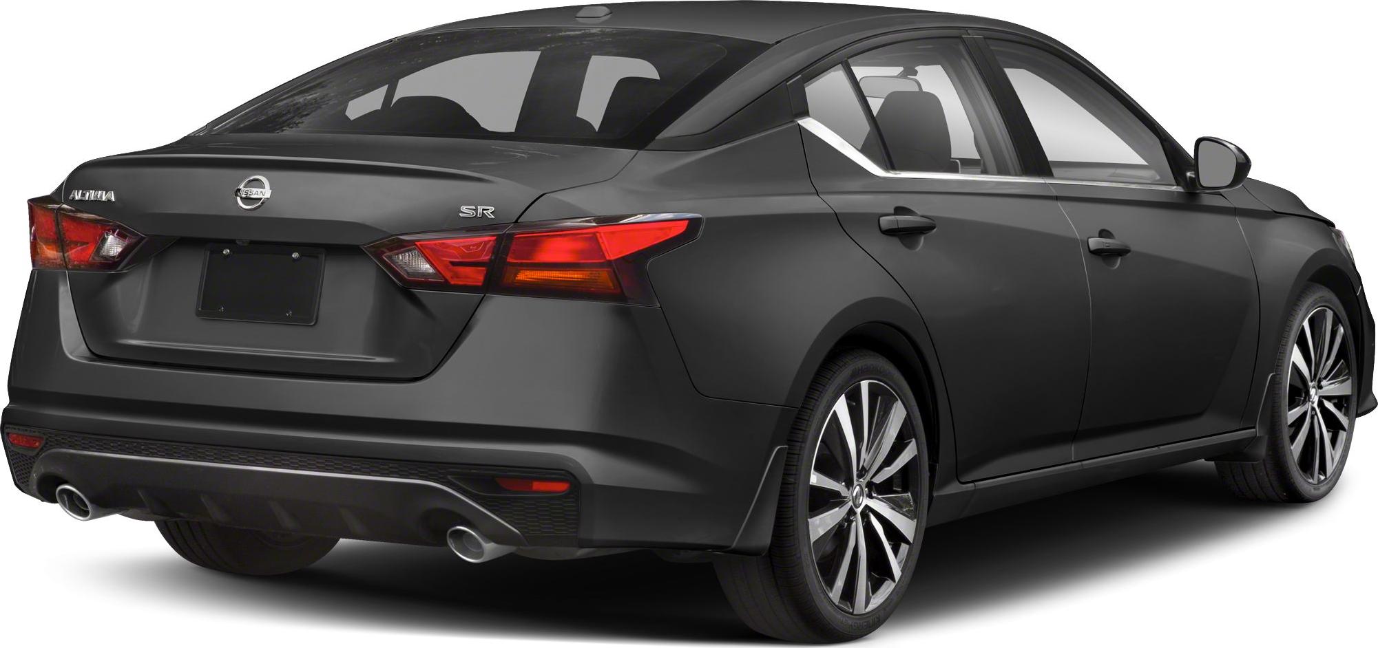 Rear side view with dual exhausts and alloy wheels on a black sedan.