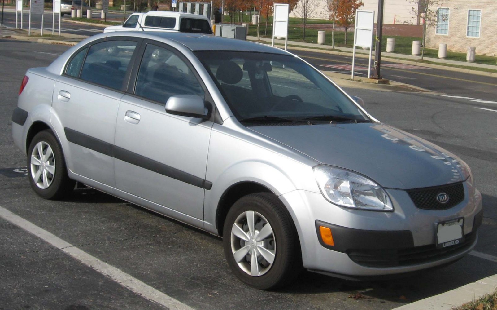 Compact silver 4-door hatchback with alloy wheels
