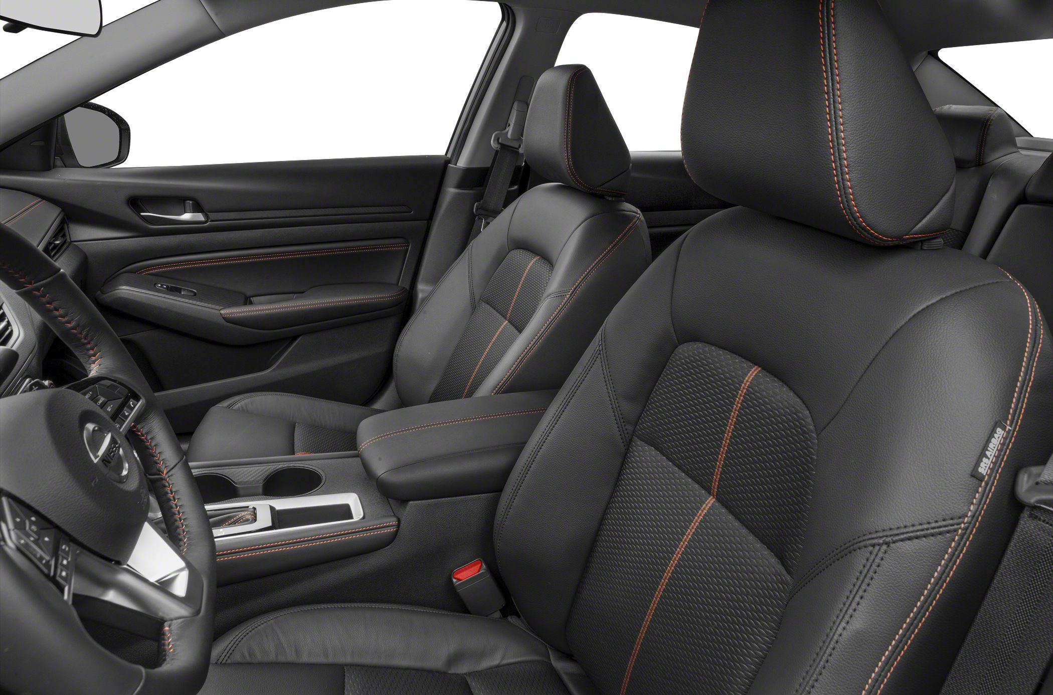 Close-up of leather car seats with orange stitching in front cabin