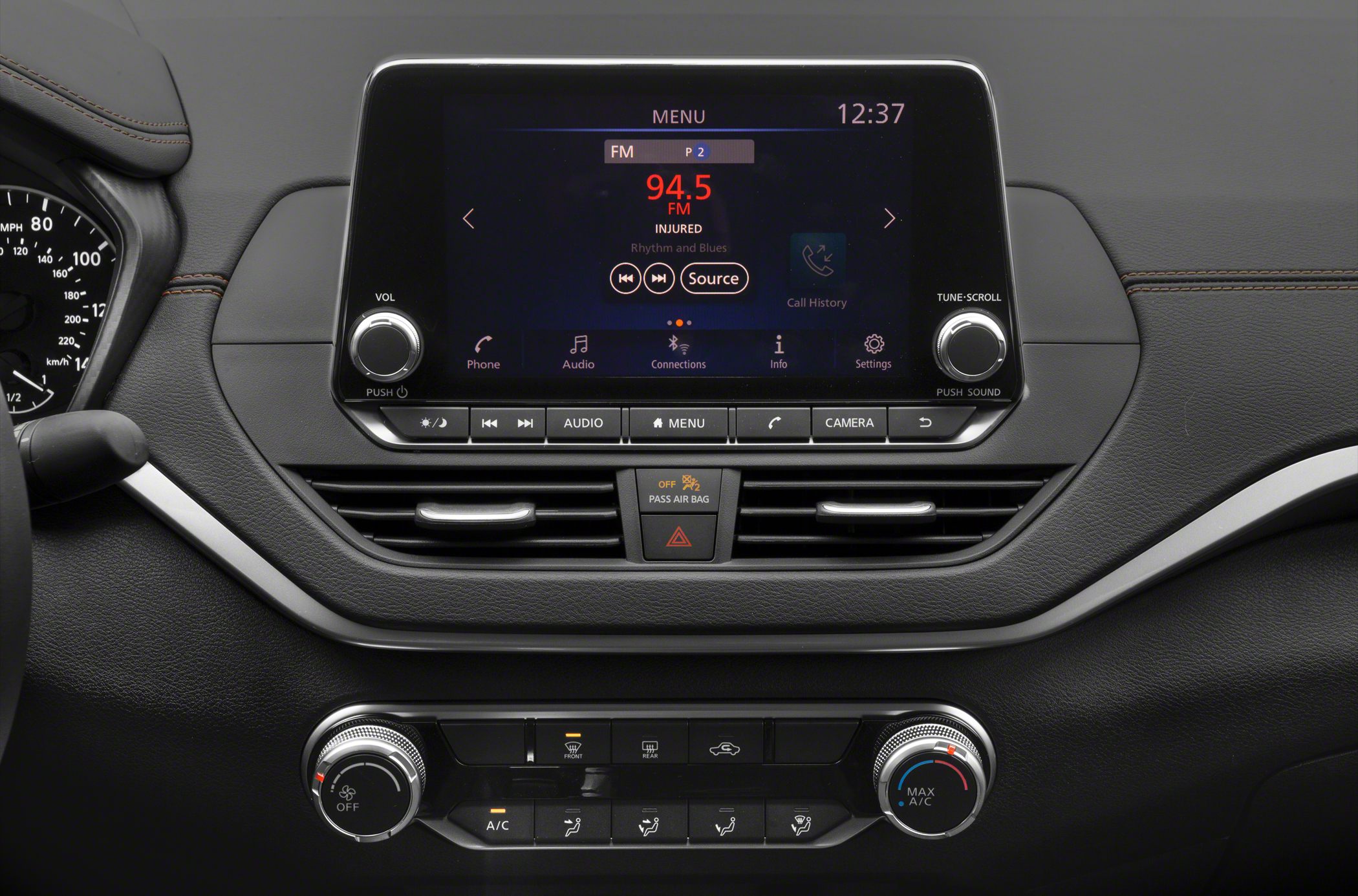 Multimedia touchscreen and climate control panel with buttons and dials
