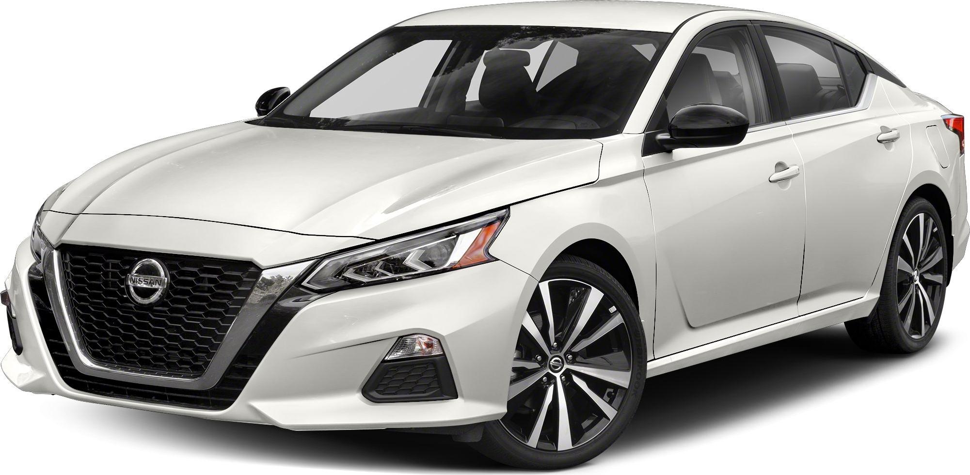 Sharp LED headlights and alloy wheels on white sedan front view