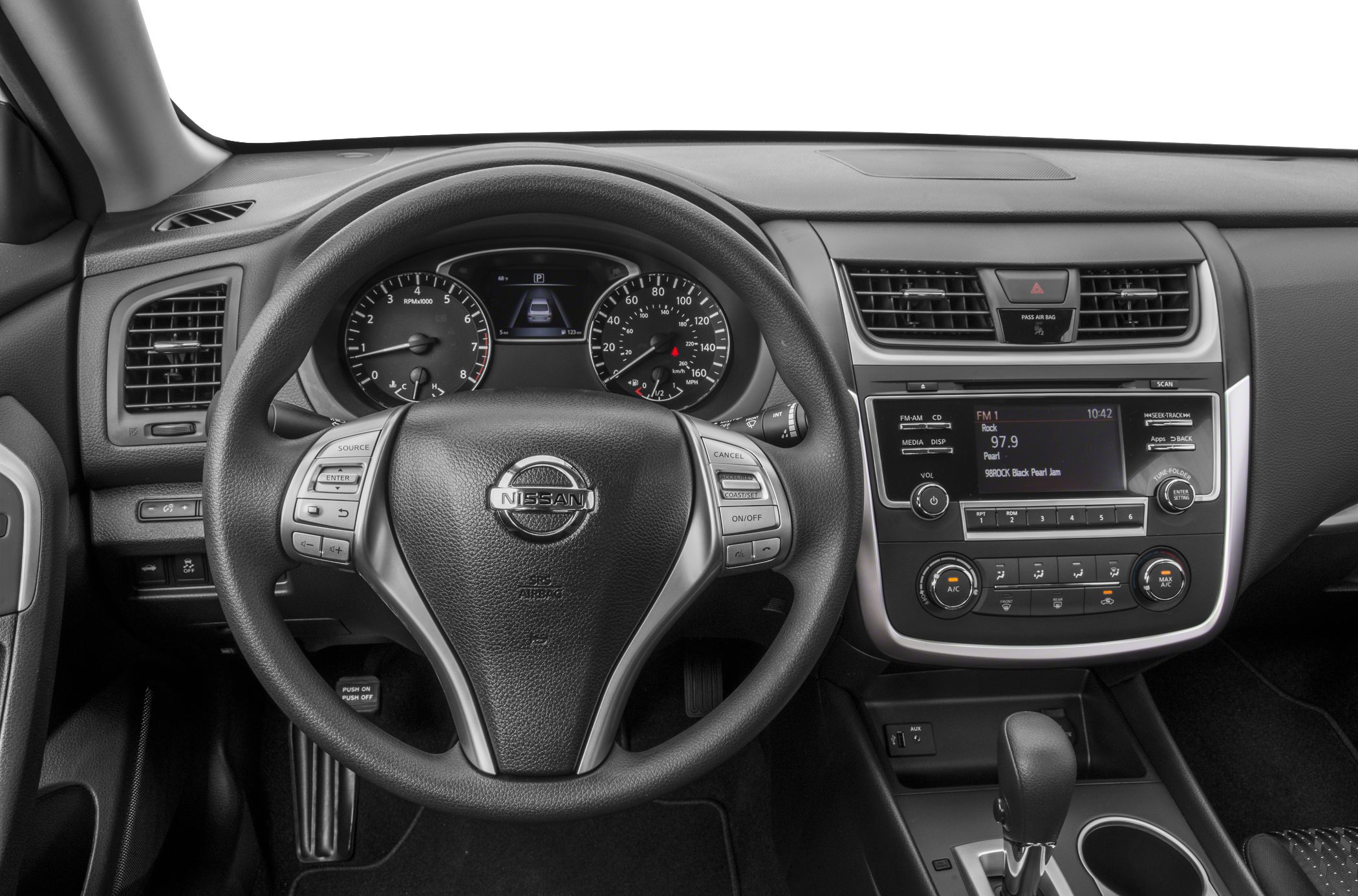 Dashboard, steering wheel, instrument cluster, and center console layout