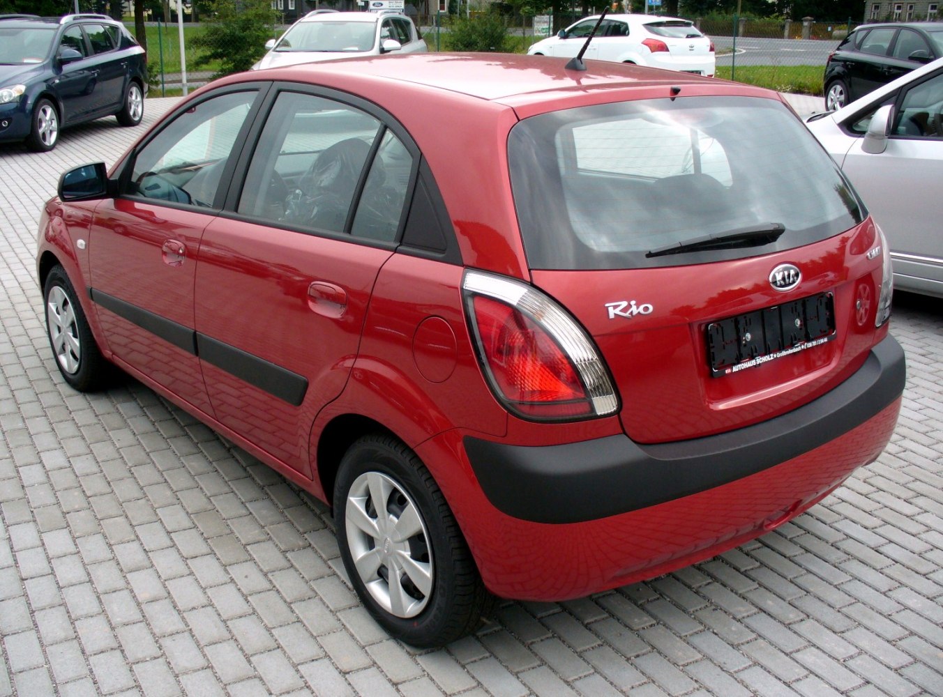 Rear view of hatchback with distinctive taillights and black bumper trim