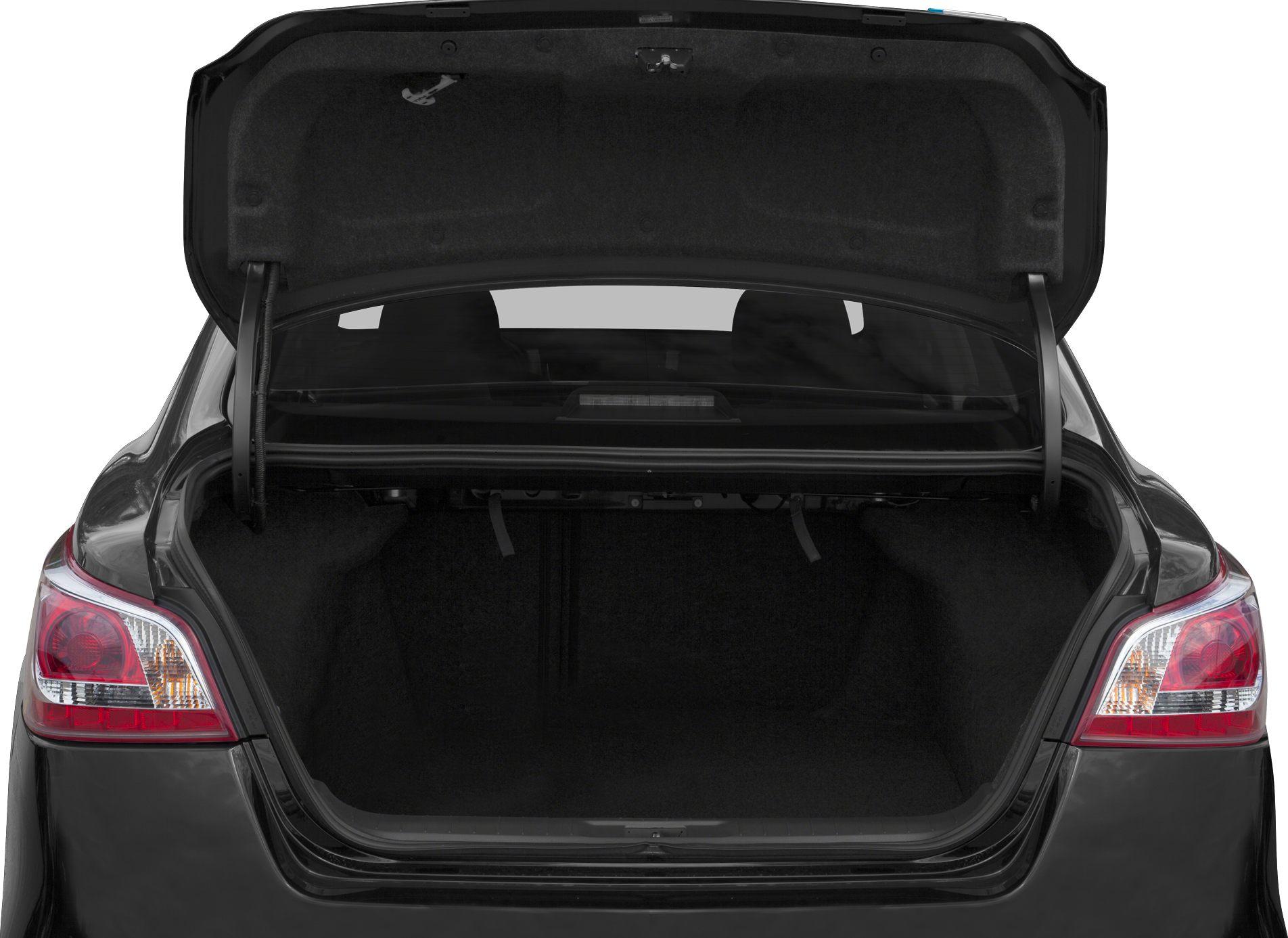 Open vehicle trunk with visible rear lights and spacious cargo area