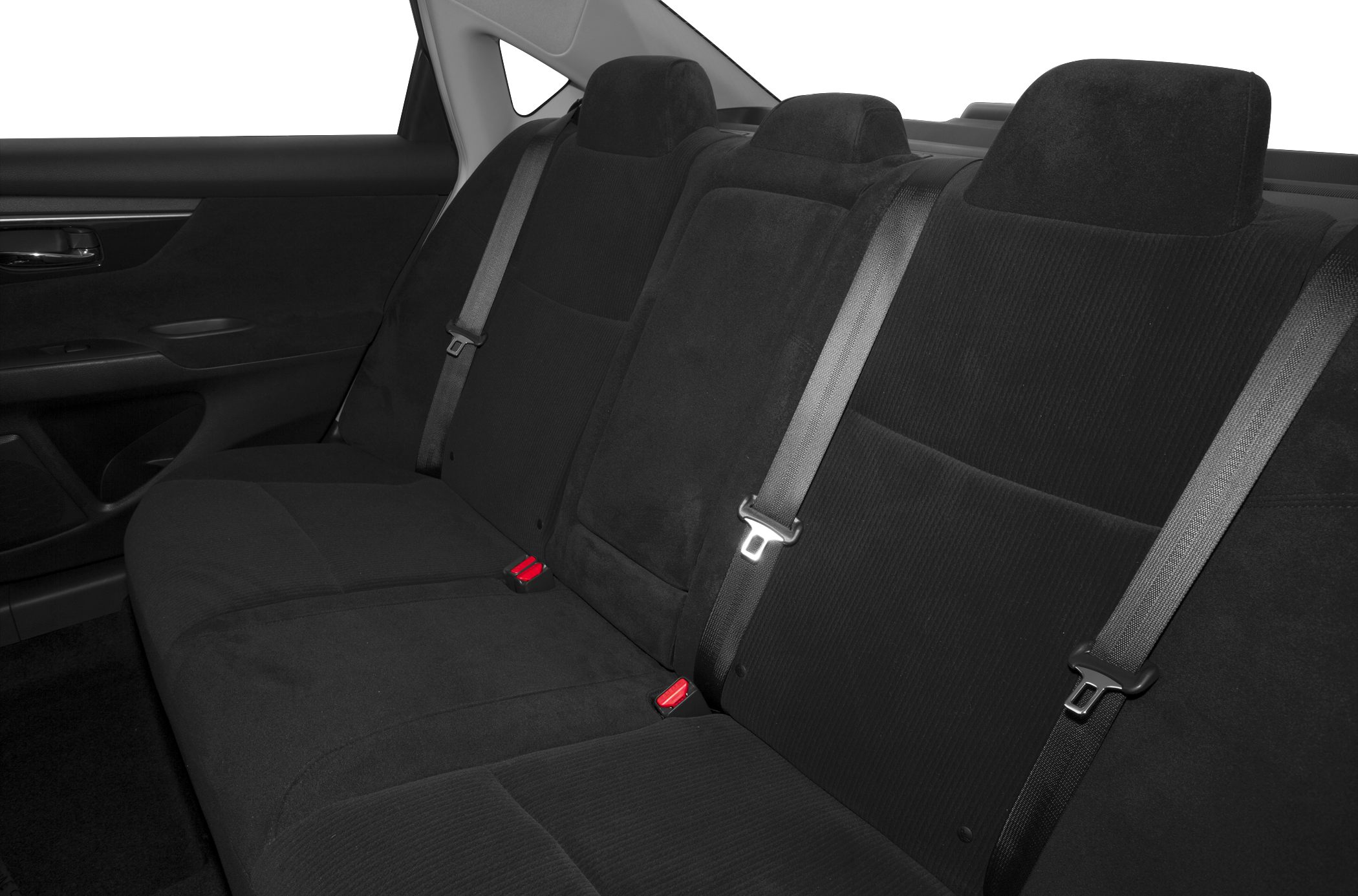 Rear seat with black fabric upholstery and three seat belts.