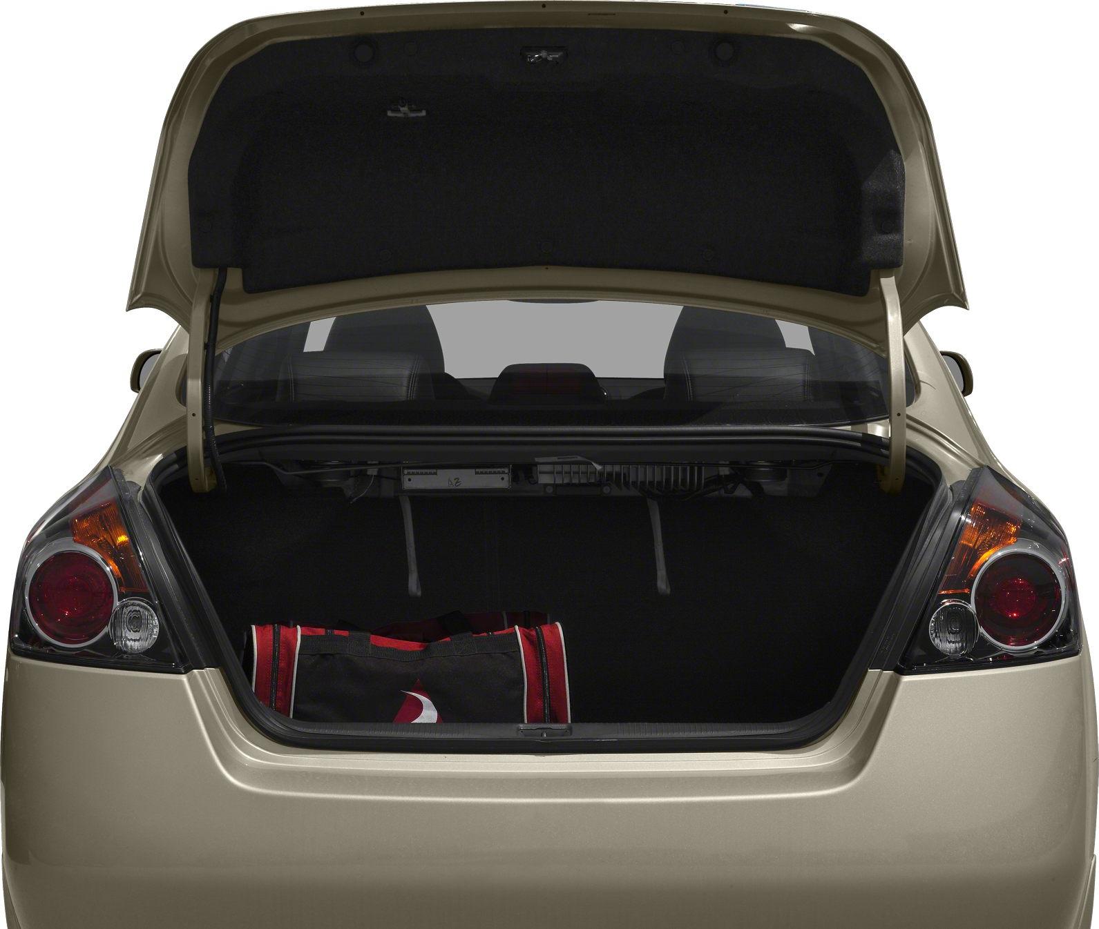 Open trunk and rear tail lamps of a sedan