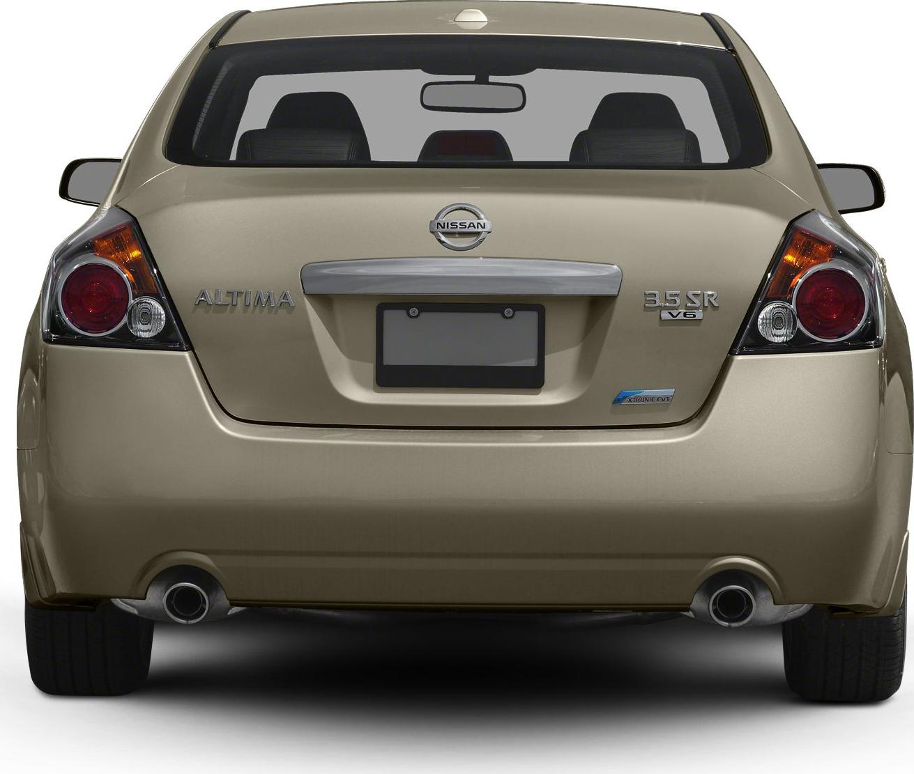Rear view with dual round exhaust, clear red taillights and badge emblems