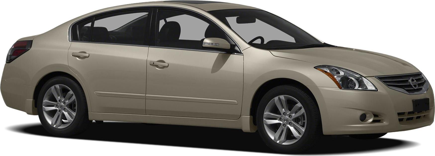 Side profile and front detail of a beige sedan with alloy wheels