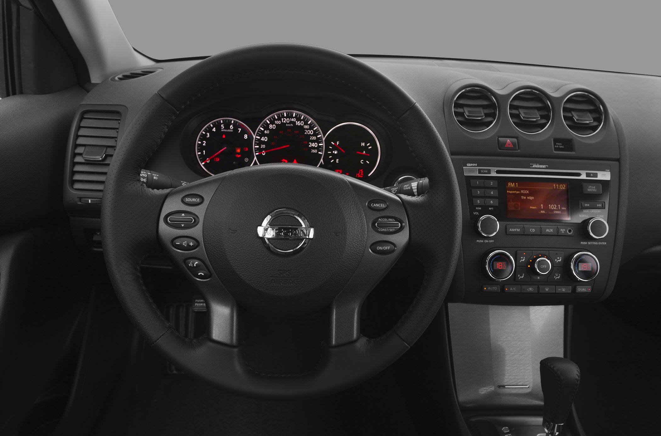 Dashboard with instrument cluster and multifunction steering wheel