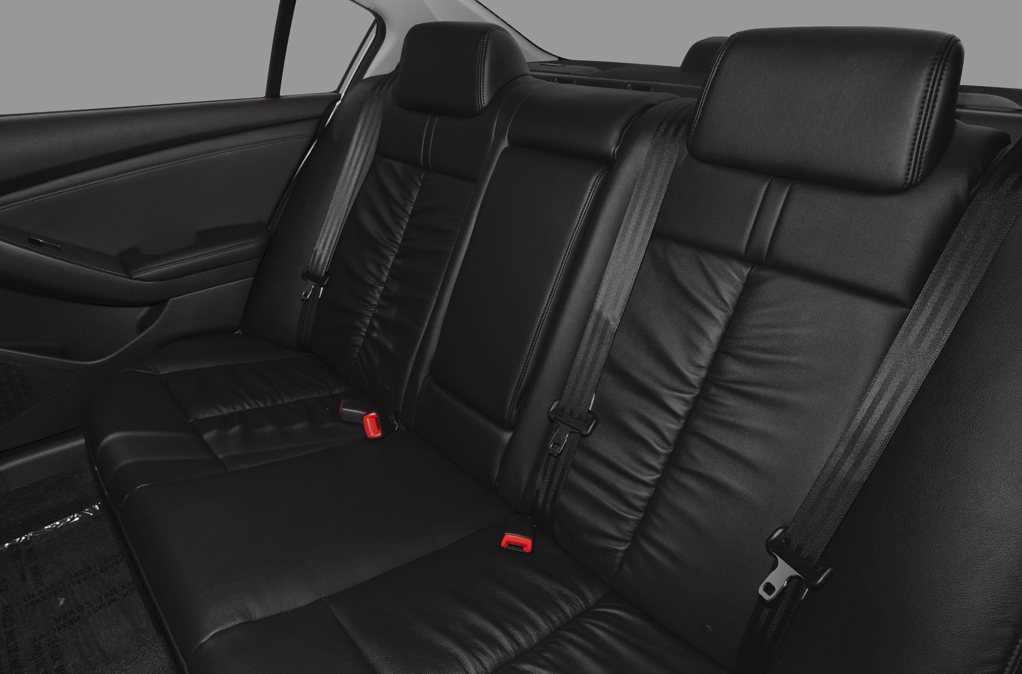 Black leather rear seats with headrests and seat belts