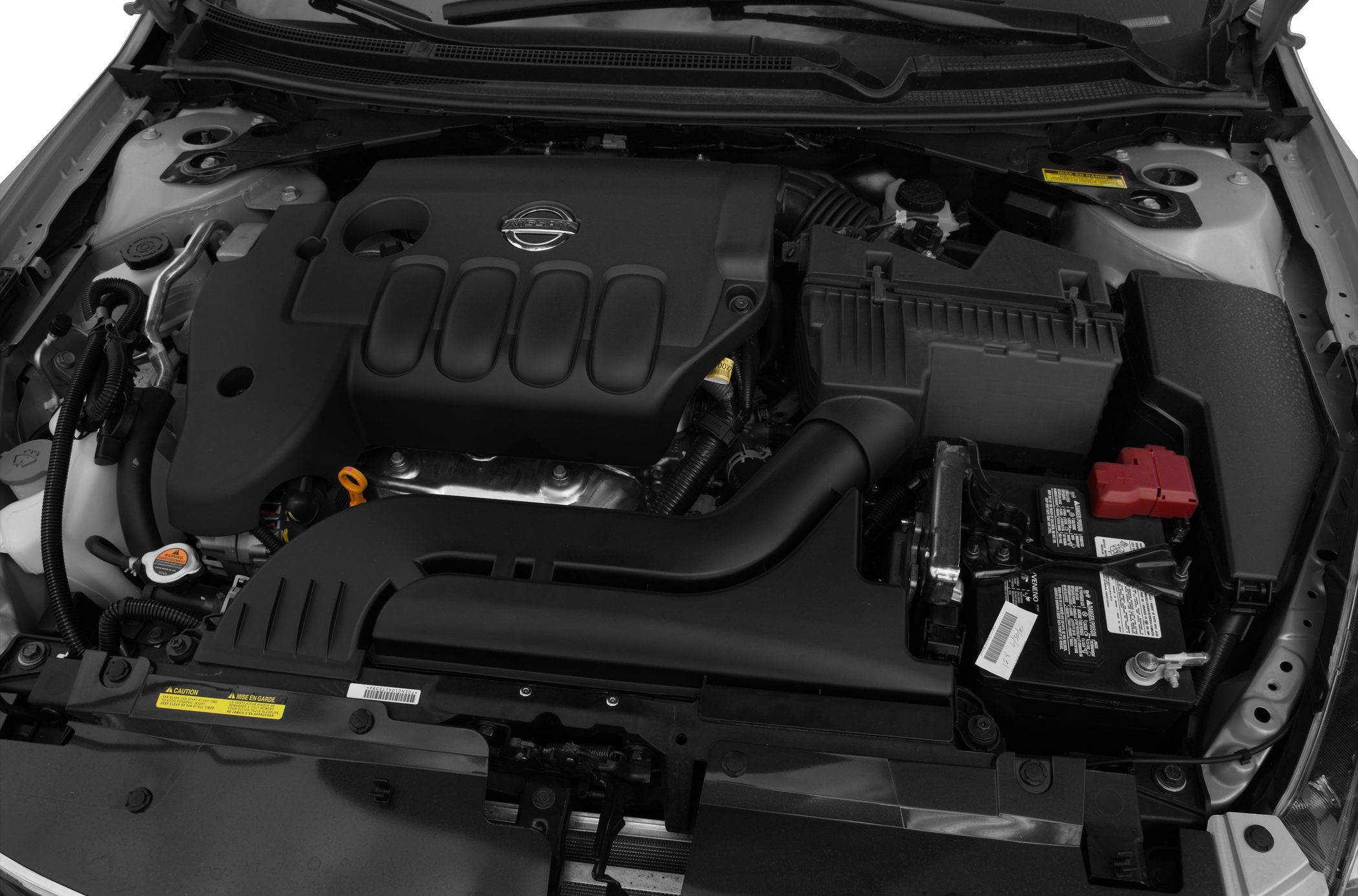 Engine bay with covered engine and air intake system