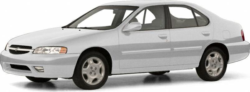 Front-side profile of white sedan with alloy wheels and aerodynamic body