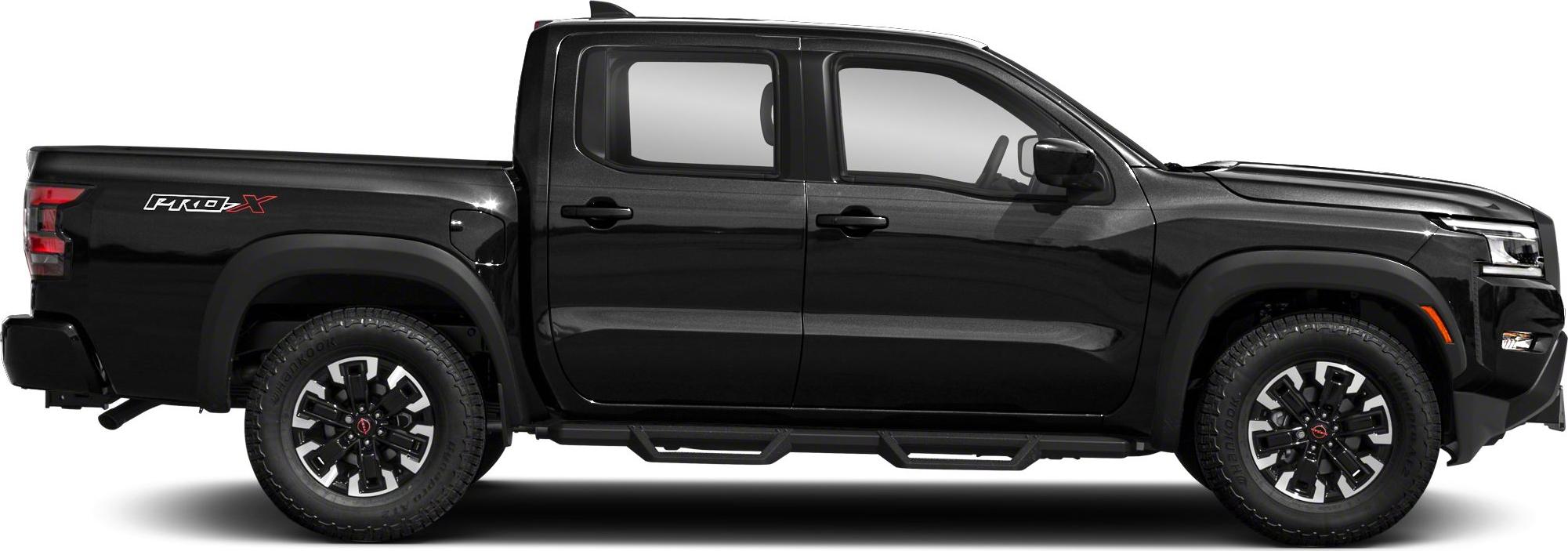 Side view of a crew cab pickup with off-road tires and rugged steps